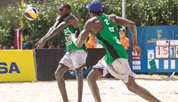 Qataru2019s Cherif Younousse and Ahmed Tijan in action at the Beach Volleyball World Tour.