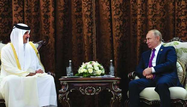 His Highness the Amir Sheikh Tamim bin Hamad Al-Thani meets with Russian president Vladimir Putin