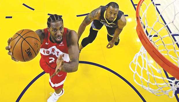Toronto Raptors forward Kawhi Leonard (2) shoots the ball against Golden State Warriors guard Andre Iguodala (9) in game six of the 2019 NBA Finals at Oracle Arena in Oakland. PICTURE: Kyle Terada-USA TODAY Sports