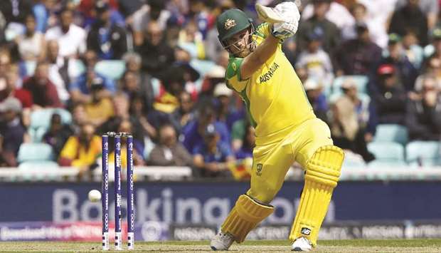 Australiau2019s captain Aaron Finch hits a four during the 2019 ICC Cricket World Cup match against Sri Lanka at The Oval in London yesterday. (AFP)