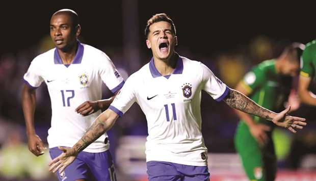 Brazilu2019s Philippe Coutinho celebrates scoring their first goal from the penalty spot during the Copa America match against Bolivia at Morumbi Stadium in Sao Paulo, Brazil, on Friday. (Reuters)
