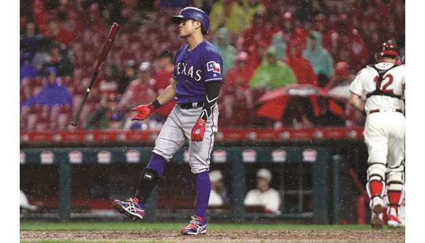 Texas Rangers left fielder Shin-Soo Choo (17) reacts after striking out against the Cincinnati Reds during the ninth inning at Great American Ball Park. in Cincinnati, Ohio. PICTURE: David Kohl-USA TODAY Sports