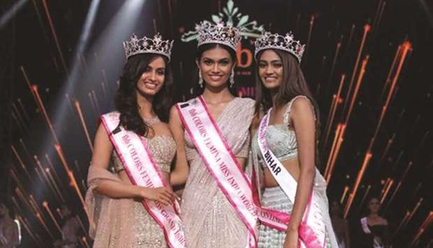 Suman Rao (centre), Shivani Jadhav (left) and Shreya Shanker pose for a photo after the crowning ceremony in Mumbai yesterday.