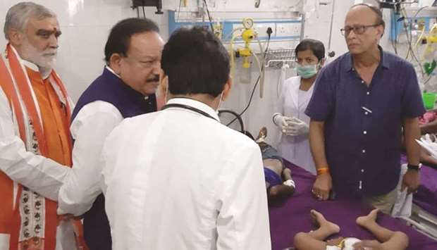 Health Minister Harsh Vardhan visits children suffering from encephalitis at a hospital in Muzaffarpur in Bihar yesterday.