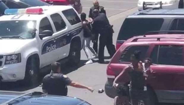 Cell phone video shows officers from the Phoenix Police Department sweep-kicking handcuffed