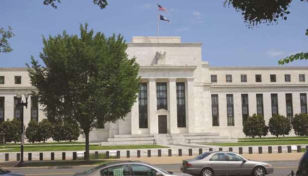 The US Federal Reserve building in Washington, DC (file). The US central bank will unveil its monetary policy announcement tomorrow, followed by both the Bank of Japan and the Bank of England on Thursday.