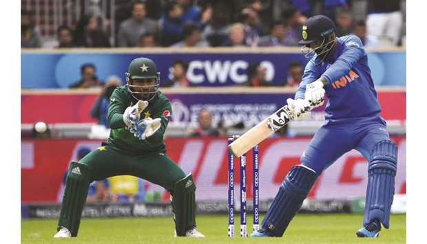 Indiau2019s K L Rahul (right) in action during the 2019 ICC Cricket World Cup match against Pakistan at Old Trafford in Manchester on Sunday. Srikkanth praised Rahulu2019s innings, seeing off a threatening bowling spell by Pakistanu2019s Mohamed Amir. (AFP)