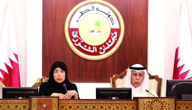 HE the Minister of Public Health Dr Hanan Mohamed and Advisory Council Speaker HE Ahmed bin Abdullah bin Zaid al-Mahmoud at the council session. HE Dr al-Kuwari delivered an address to the Advisory Council.