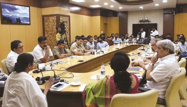 West Bengal Chief Minister Mamata Banerjee holds talks with junior doctors in Howrah, near Kolkata yesterday.