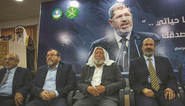 Members of the Jordanian Islamic Action Front Party (IAF) receive condolences for the death of Egyptu2019s former president Mohamed Mursi at the IAF headquarters in the capital Amman, yesterday.