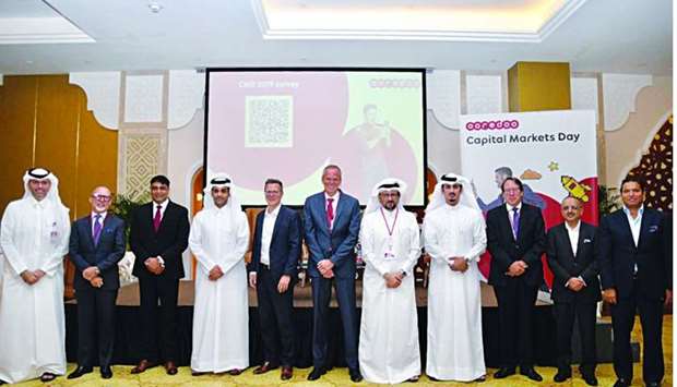 Al-Sayed together with other senior officials during Ooredoo's annual u2018Capital Markets Dayu2019 held recently in Doha.