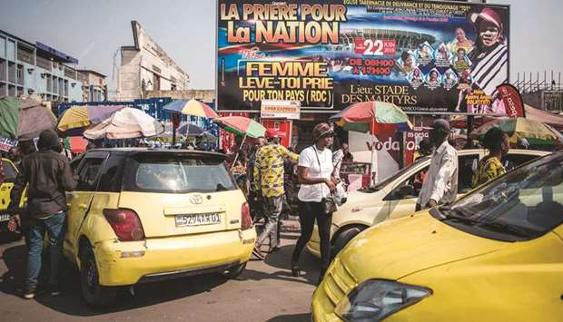 Yellow taxis clog up the streets of Kinshasa.