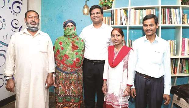 Abdul Aziz, his wife Shazia, Sujeet Kumar and his wife Manjula Devi are seen with Priyadarshi Ranjan.