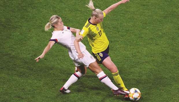 Swedenu2019s Stina Blackstenius in action with Abby Dahlkemper of the US during their World Cup match on Thursday night.