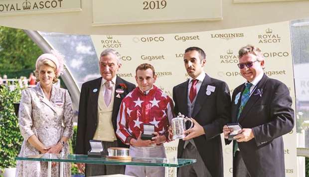 Duke of Edinburgh Stakes winners pose during the prize distribution ceremony after Baghdad won at Royal Ascot. PICTURES: Zuzanna Lupa