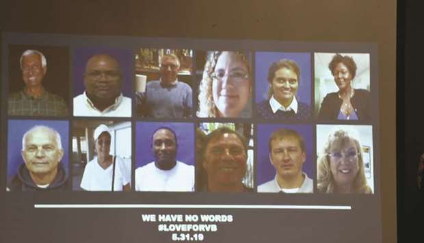 A slide of the victims of the May 31 mass shooting at Virginia Beach municipal building being shown during a media briefing yesterday.