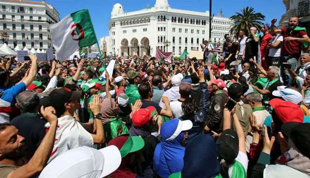People take part in an anti-government protest in Algiers, Algeria