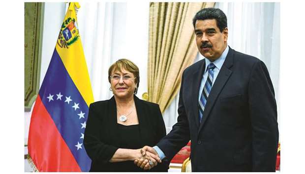 Venezuelan President Nicolas Maduro meets Chilean High Commissioner for Human Rights Michelle Bachelet at the Miraflores Presidential Palace in Caracas on Friday.