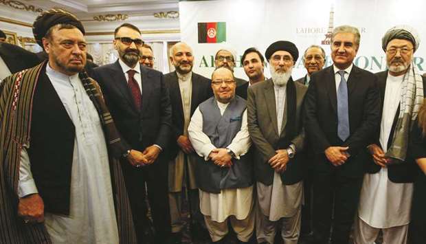 Afghan delegates with Foreign Minister Qureshi ahead of a peace conference in Punjabu2019s Bhurban town.