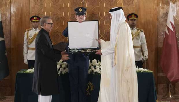 Pakistan President Dr Arif Alvi confers the ,Nishan-e-Pakistan, award on His Highness the Amir Sheikh Tamim bin Hamad al-Thani in Islamabad