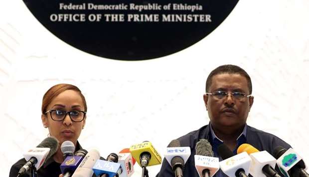 Nigusu Tilahun, Press Secretary at the office of the Ethiopian Prime Minister, and his deputy Billene Seyoum address a news conference on the attempted coup in Addis Ababa, Ethiopia
