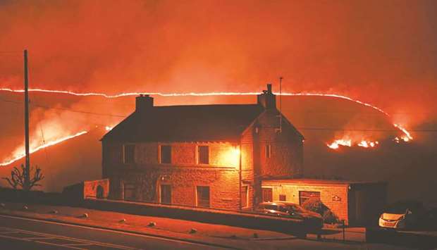 A wildfire burns on Saddleworth Moor on February 26, the countryu2019s hottest winter day on record.