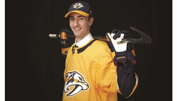 Alexander Campbell reacts after being picked by Nashville Predators during the NHL Draft in Vancouver, Canada. (AFP)