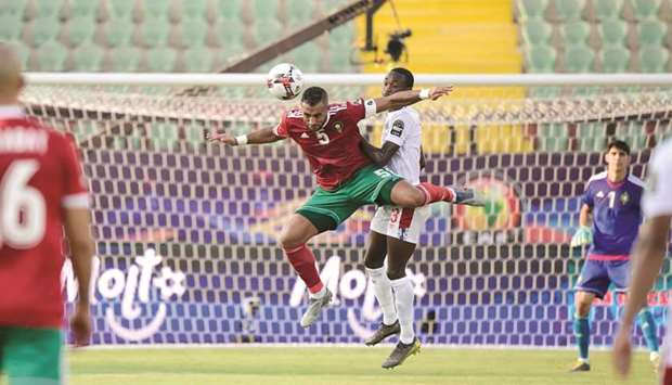 Morocco defender Medhi Benatia (L) vies for the header with Namibia forward Peter Shalulile during their Africa Cup of Nations (CAN) match in Cairo yesterday.