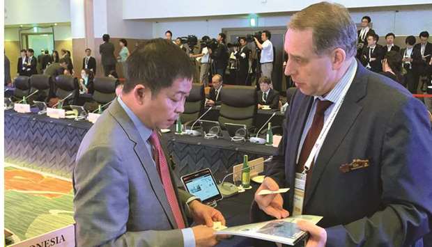 GECF secretary-general Dr Yury Sentyurin (right) speaking with a delegate on the sidelines of the recent u2018G20 Ministerial Meeting on Energy Transitions and Global Environment for Sustainable Growthu2019 in Karuizawa, Japan.