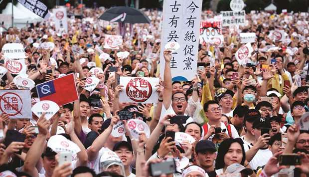 Protesters at the rally on Ketagalan Boulevard in Taipei yesterday.