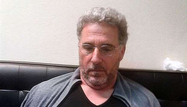 Handout file photo released by the Italian Police on September 4, 2017 showing Italian Rocco Morabito, wanted for more than 20 years for drug trafficking and mafia activities, during his arrest in Uruguay