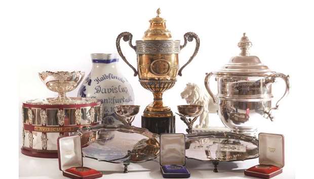 A handout photograph released by Wyles Hardy on June 21, 2019 shows replica trophies, medals and other memorabilia of German tennis star Boris Becker put up for auction by the trustees of Beckeru2019s bankruptcy estate through their agents Wyles Hardy in Hemel Hempstead, north of London.