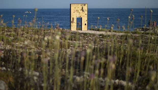 The ,Door of Europe, monument, which commemorates migrants who died on their journey, is seen on the Sicilian island of Lampedusa, Italy
