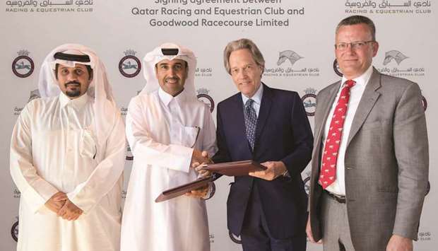 The sponsorship renewal agreement was signed by Qatar Racing and Equestrian Club (QREC) chairman Issa bin Mohamed al-Mohannadi (second from left) and the Duke of Richmond (second from right) in the presence of QREC CEO Nasser bin Sherida al-Kaabi (left).