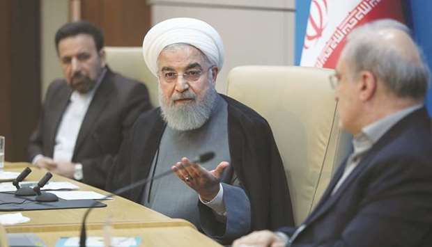 A handout picture provided by the Iranian presidency shows President Hassan Rouhani  during a meeting with healthy ministry officials in Tehran, yesterday.