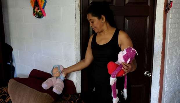 Rosa Ramirez, mother of Oscar Alberto Martinez Ramirez, a migrant who drowned in the Rio Grande River with his daughter Valeria during their journey to the U.S., is pictured at her house in the Altavista neighbourhood in San Martin, El Salvador