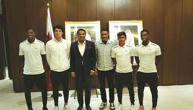HE the ambassador of the State of Qatar to Singapore Abdullah bin Ibrahim al-Hamar (C) with the Qatar Davis Cup team at a dinner hosted by him on Tuesday.