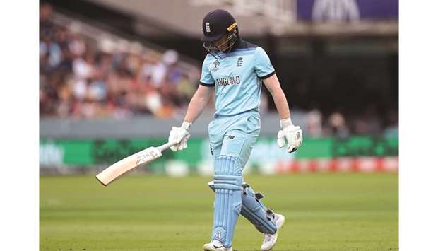 Englandu2019s Eoin Morgan looks dejected after losing his wicket during the 2019 ICC Cricket World Cup match against Australia at Lordu2019s Cricket Ground in London on Tuesday. (Reuters)