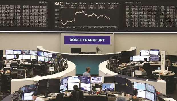 The German share price index DAX graph is seen at the Frankfurt Stock Exchange. The DAX 30 gained 0.1% to 12,245.32 points yesterday.