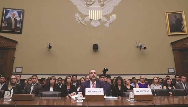 Henry Kerner, special counsel in the Office of Special Counsel, testifies next to the empty seat of White House counsellor Kellyanne Conway at a House Oversight and Reform Committee hearing on Capitol Hill in Washington.