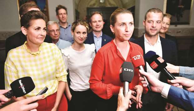 (From left) Pia Olsen Dyhr of the The Socialist Peopleu2019s Party, Pernille Skipper of The Red-Green Alliance, Mette Frederiksen of The Danish Social Democrats and Morten Oestergaard of The Social Liberal Party talk to the press after finalising government negotiations at Christiansborg Castle in Copenhagen, Denmark, shortly before midnight on Tuesday.
