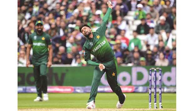 Pakistanu2019s Mohamed Amir delivers a ball during the 2019 ICC Cricket World Cup match against New Zealand at Edgbaston in Birmingham, United Kingdom, on Wednesday. While Wasim Akram was the leading wicket-taker in 1992 with 18, another left-arm pacer, Amir, is second on the bowleru2019s chart with 16 so far. (AFP)