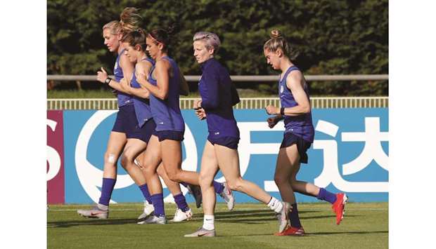 United Statesu2019 co-captain Megan Rapinoe (second right) trains with teammates in Croissy, France, yesterday. (Reuters)
