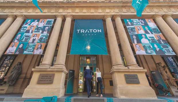 Traton posters are fixed at the entrance to the stock exchange in Frankfurt. Volkswagenu2019s trucks unit fell on its first day of trading as investors took a cautious stance on its global expansion plan, which includes boosting its US footprint and going head-to-head with market leaders Daimler and Volvo Group.