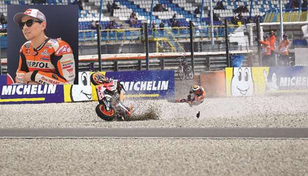 Hondau2019s Spanish rider Jorge Lorenzo (also inset) is thrown off his bike during an accident in practice for the Dutch Grand Prix in Assen, Netherlands, yesterday. (MotoGP)