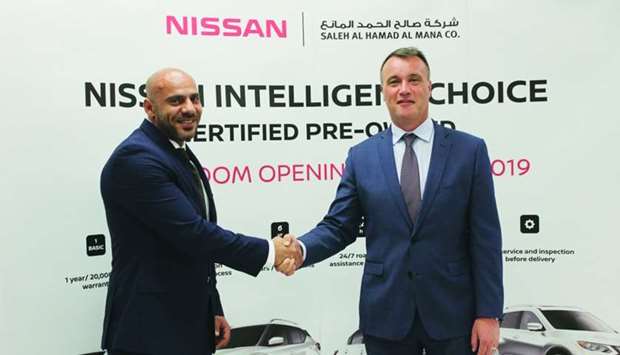 Officials mark the launch of the Nissan Intelligent Choice programme.