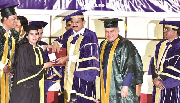 Vice President M Venkaiah Naidu presents a gold medal to a student at the Graduation Day Ceremony of the Muffakham Jah College of Engineering and Technology in Hyderabad yesterday.