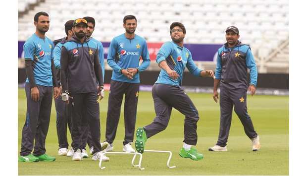 Pakistanu2019s Imam-ul-Haq (centre) takes part in a training session in Nottingham, England, on the eve of their 2019 ICC Cricket World Cup match against England. (AFP)
