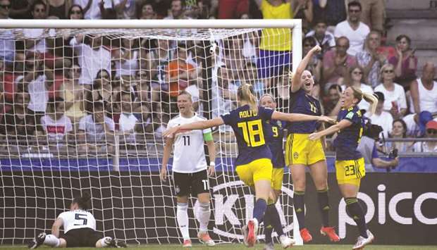 Swedenu2019s Stina Blackstenius (second right) celebrates after scoring against Germany during the Womenu2019s World Cup quarter-final match in Rennes, France. (AFP)