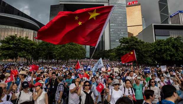 Demonstrators rally in support of police outside the Legislative Council in Hong Kong